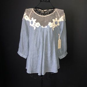 Denim blouse with floral detail